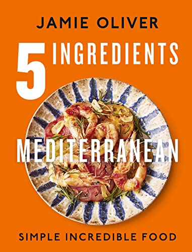 Cookbook cover featuring shrimp and tomatoes on a patterned plate.