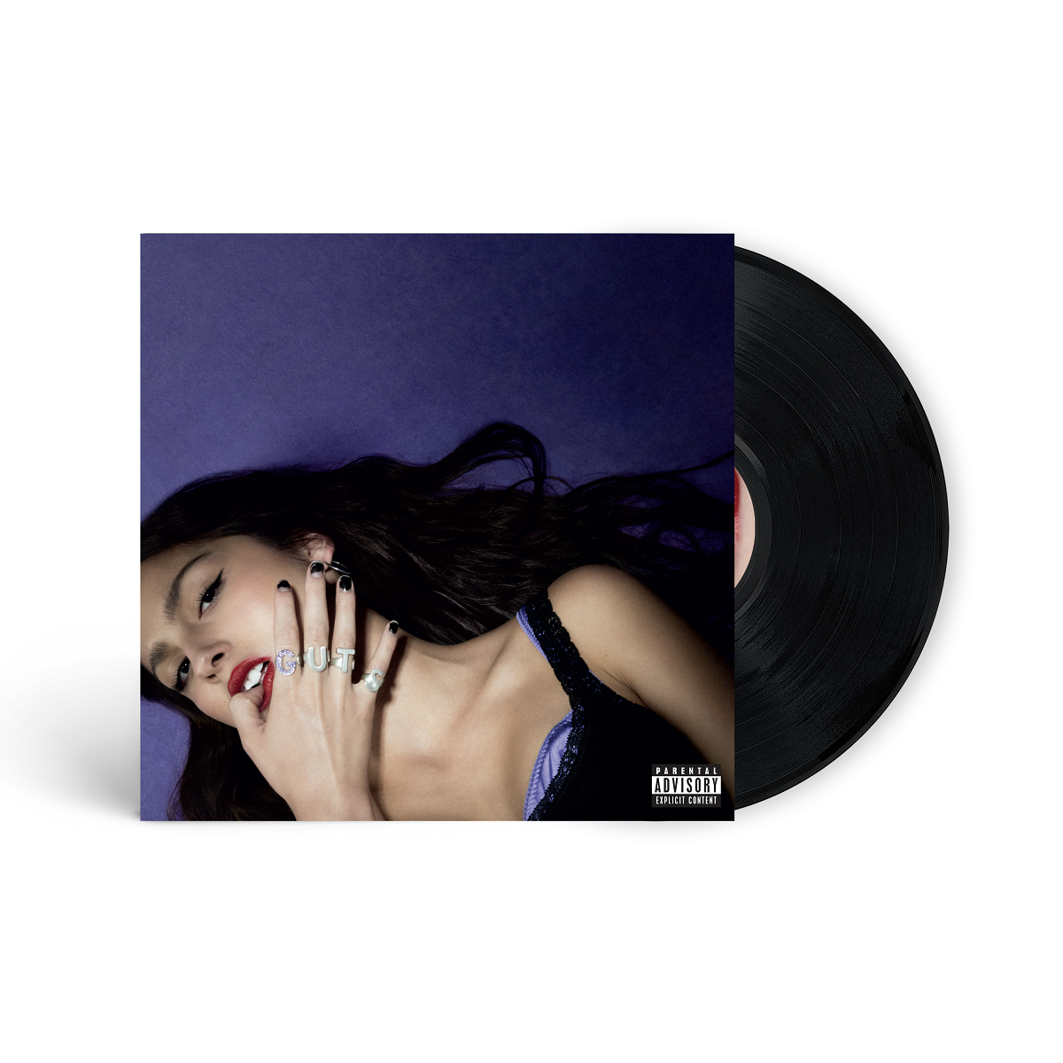 Olivia Rodrigo’s “GUTS” vinyl record with a purple cover and black disc.