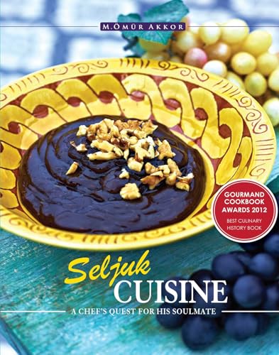 Cookbook cover featuring dark dessert with walnuts, grapes, and yellow plate.