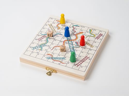Snakes and Ladders board game with colorful wooden playing pieces and dice.