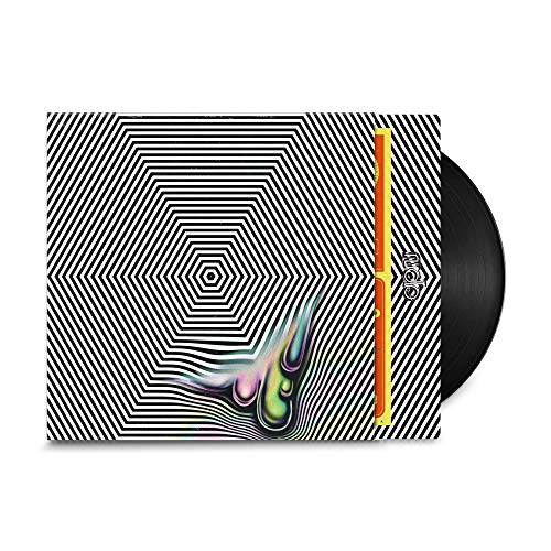 Vinyl record in a sleeve with black and white hexagon patterns and liquid shapes.