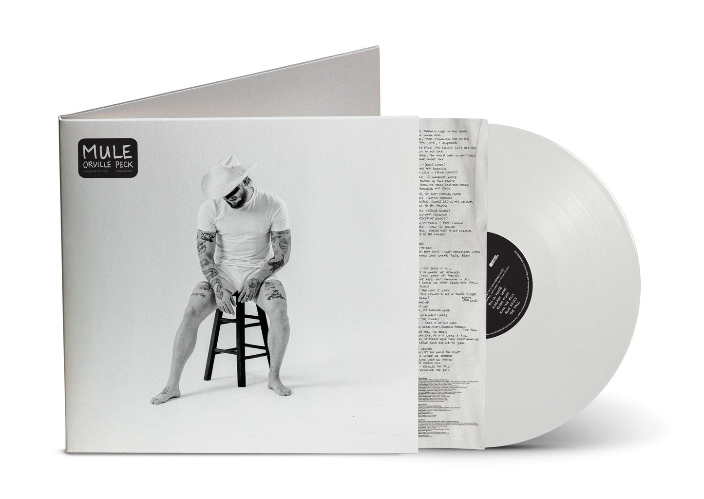 White vinyl record of Orville Peck’s “Mule” with a cowboy portrait.