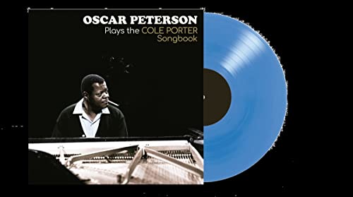 Oscar Peterson album cover and solid blue vinyl record shown.