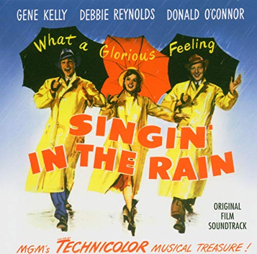 Three people in yellow raincoats and umbrellas, with "Singin In The Rain" text.