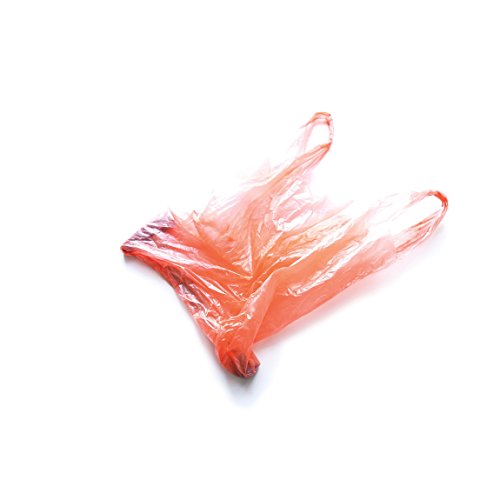 Crinkled, translucent red plastic bag isolated on a white background.
