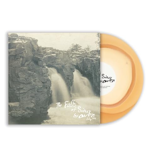Vinyl record cover featuring a waterfall and rocky cliffs with a yellow vinyl disc.