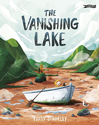 A child in a yellow raincoat sits in a boat on a dry lakebed.