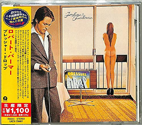 CD case for Robert Palmer’s “Pressure Drop” album, featuring a man and woman.