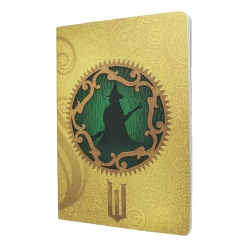 Gold notebook cover with silhouette of a witch in a green circle.