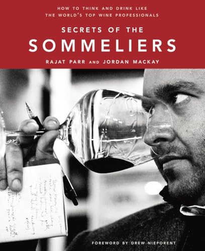 Book cover showing a man holding a wine glass and a notepad, black and white.