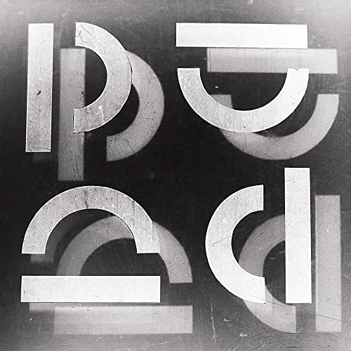 Black and white abstract geometric shapes arranged in a square composition on textured background.