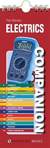 Red spiral-bound "Electrics Companion" book with a digital multimeter image.