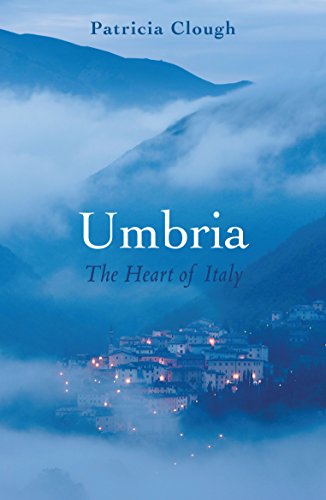 Book cover: Umbria, Italy, with a hilltop town in the mist.