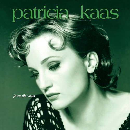 Patricia Kaas album cover, close-up portrait of a woman in green tones.