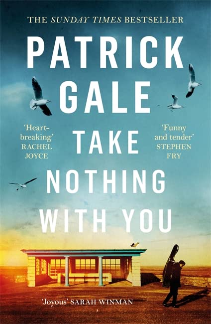 Book cover featuring a man with a cello case near a shelter under seagulls.