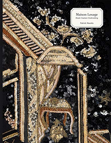Book cover featuring intricate gold and silver embroidery details.