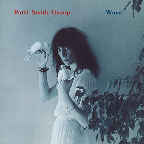Patti Smith album cover, “Wave,” featuring a woman with two white doves.