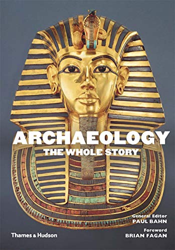 Golden pharaoh’s mask on book cover for "Archaeology: The Whole Story".