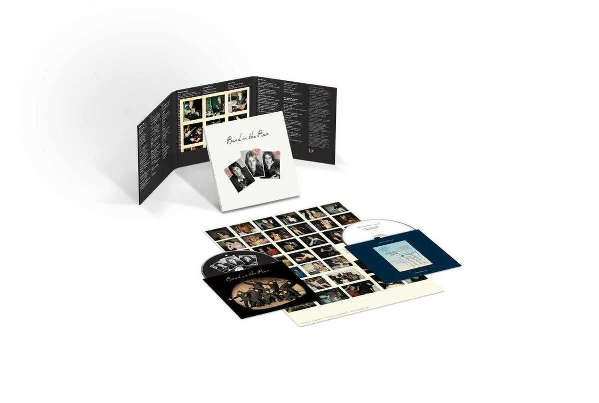 Paul McCartney's "Band on the Run" 50th Anniversary CD box set displayed.