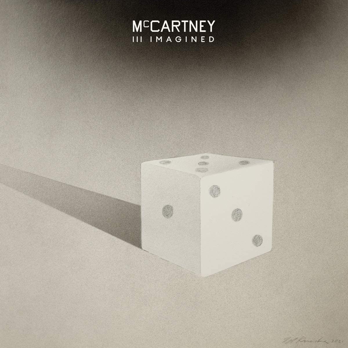 Album cover: white die casting a shadow, text “McCartney III Imagined”.