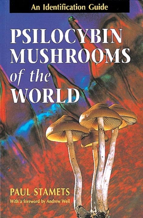 Book cover featuring brown psilocybin mushrooms against a colorful, blurred background.