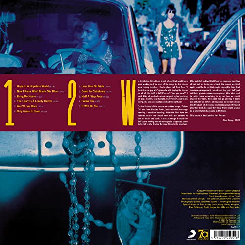 Vinyl record back cover featuring a man driving and a woman in a blue dress.