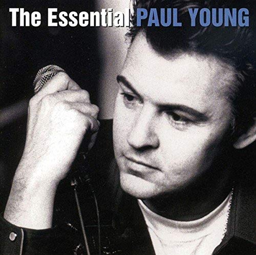 Black and white album cover featuring singer Paul Young with a microphone.