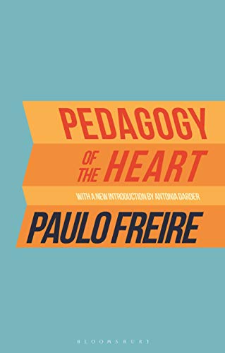 Book cover with orange text on a blue background, titled Pedagogy of the Heart.