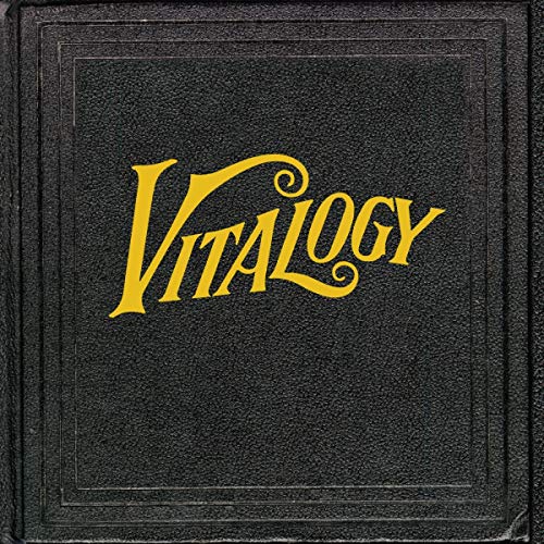 Pearl Jam’s Vitalogy CD cover: black textured background, gold lettering.