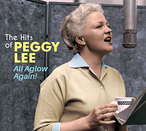 Peggy Lee singing into a microphone in a recording studio.