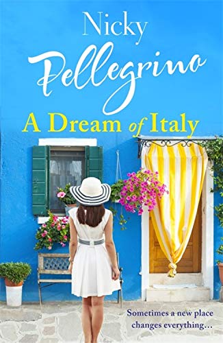Book cover: woman in white dress facing Italian building with flowers.