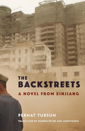 Book cover for “The Backstreets,” featuring unfinished buildings and a figure.