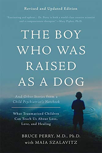 Book cover: “The Boy Who Was Raised as a Dog” with a child’s silhouette.