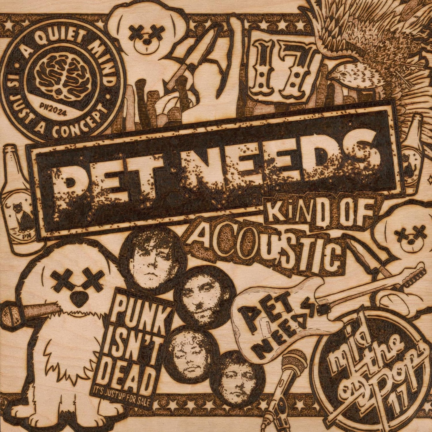 Wood-burned CD cover for "Pet Needs - Kind Of Acoustic" with collage imagery.