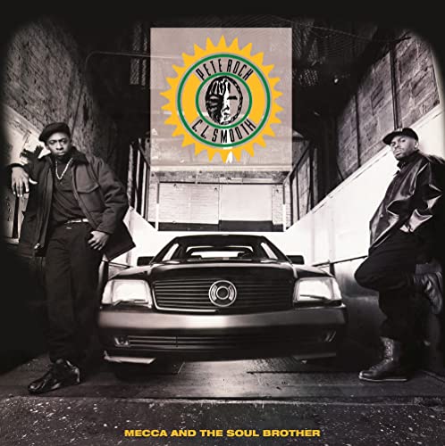 Pete Rock and C.L. Smooth stand beside a black car in this album cover.