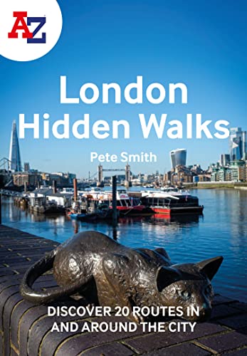 Book cover showing a bronze cat statue overlooking the River Thames and London skyline.