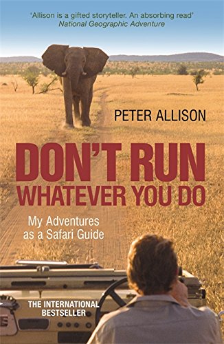 Book cover: elephant facing viewer, safari vehicle, and title "Don't Run.