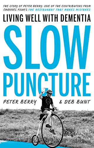 Book cover: "Slow Puncture" with image of a cyclist and blue text.