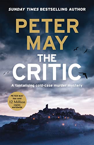 Book cover for The Critic by Peter May featuring a hilltop village at dusk.