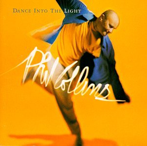 Phil Collins album cover: blurred image of a man dancing in orange.