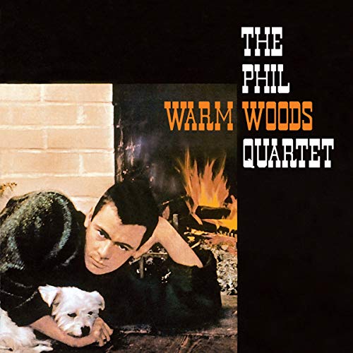 Album cover: man with dog by fireplace, "The Phil Woods Quartet Warm Moods".