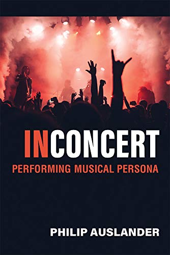 Book cover: concert crowd with raised hands, red lighting, and title text.