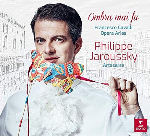 Man in white shirt holding colorful marionette strings, opera album cover with text.