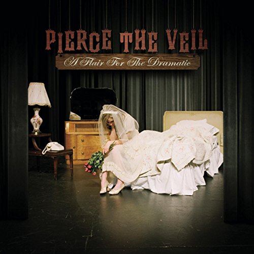 Album cover: woman in a wedding dress sits on a bed.