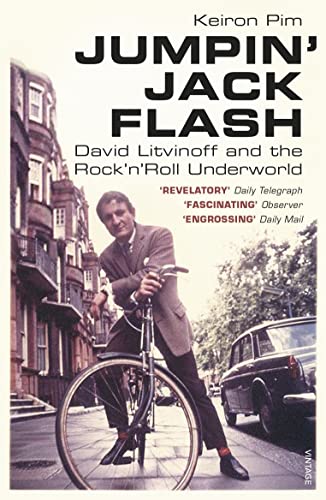 Book cover: man on bicycle, London street, title "Jumpin' Jack Flash".