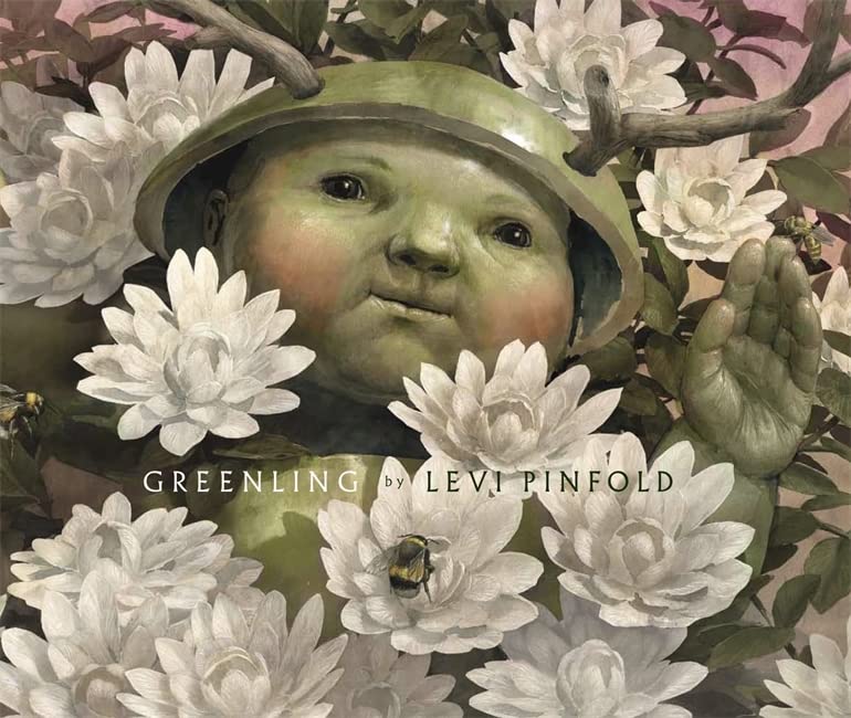 Child’s face emerging from white flowers and green foliage.