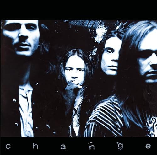 Dark, moody portrait of four people with the album title "Change".