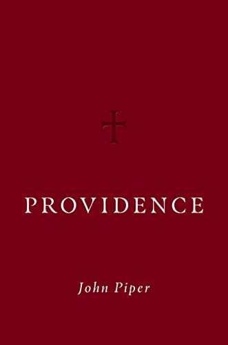 Red book cover with white text reading "Providence" by John Piper, plus a cross.