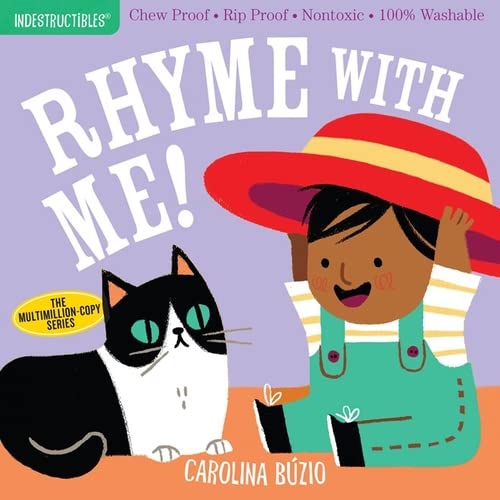 Book cover with a child, cat, and colorful text reading “Rhyme with Me!”.