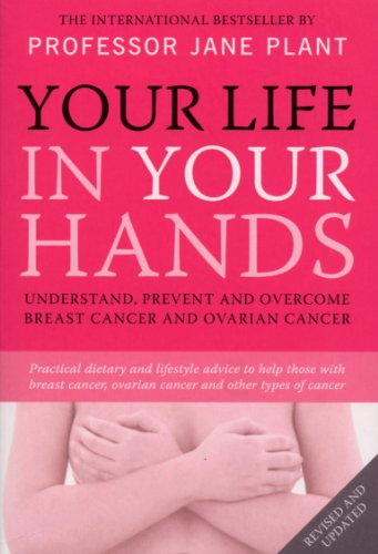 Pink book cover with white text: "Your Life In Your Hands," and a subtle image of hands.